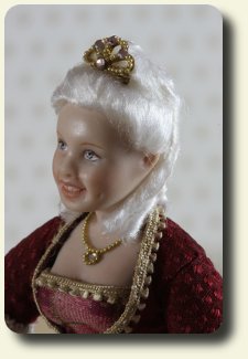 CDHM artisan Vynette van der Heijden creates handmade sculpted and dressed 1:12 dolls in dollhouse scale