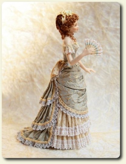 CDHM artisan Elisa Fenoglio, side view of miniature porcelain doll in 1800's dress
