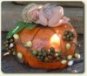 Fairy baby sleeping on ooak pumpkin in 1:12 scale by Sue Anne McConnell of Toodle Socks ArtDolls