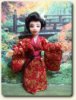Handmade geisha doll in 1/12 scale for dollhouse miniature by CDHM and IGMA artisan Julie Campbell of Bellabelle Dolls