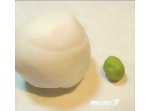 Combining the green and white polymer clay to make the dolls house apples