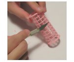 Using found object plastic hair roller