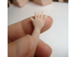 Rounding off the finger tips of the polymer clay hands