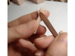 Flattening the polymer clay hands