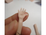Creating additional detail on the palm of the doll hand