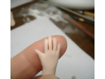Squaring the finger tips of the fingers of the polymer clay hands